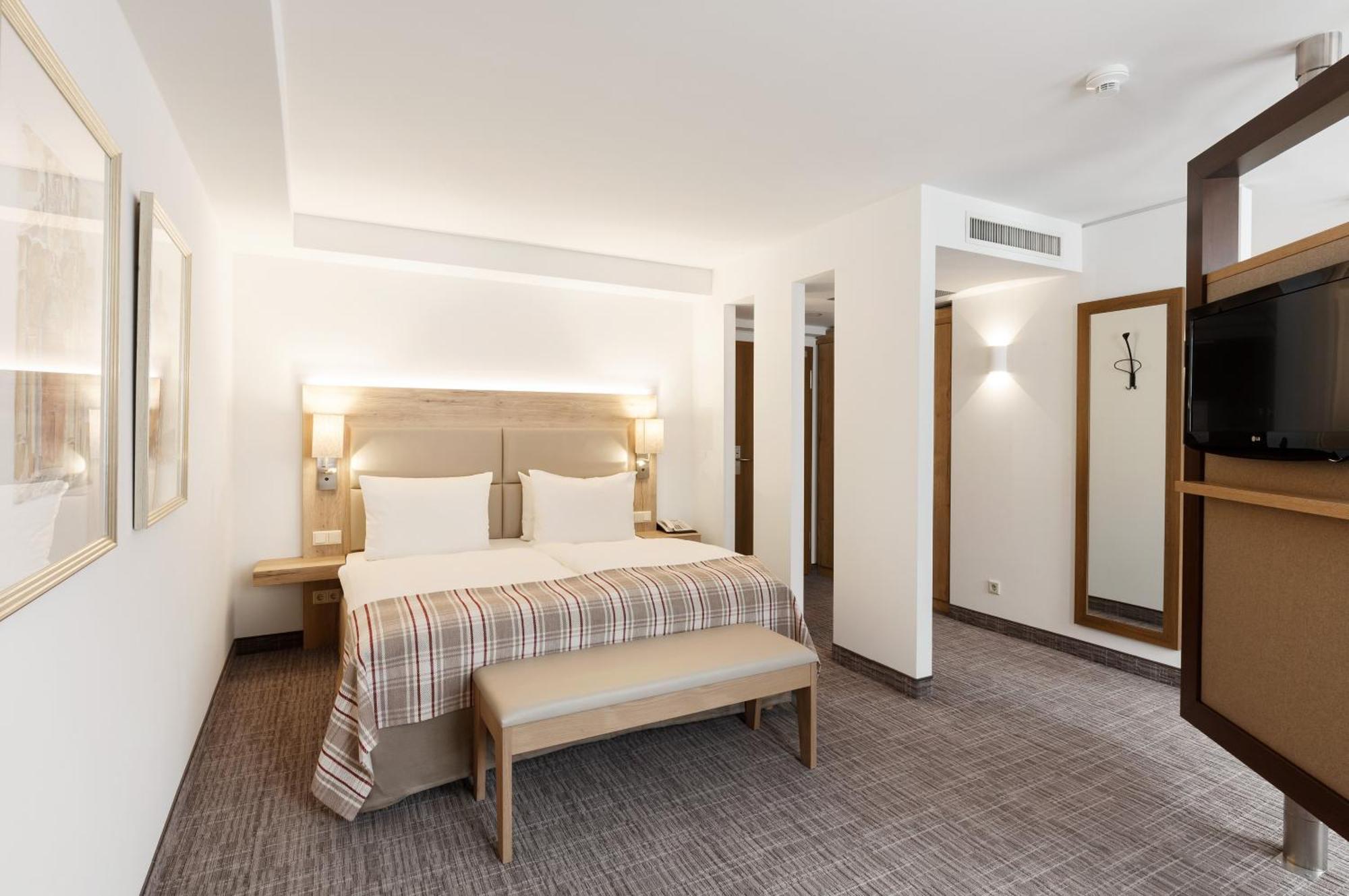 Habitación Premium con 1 cama extragrande y 1 litera